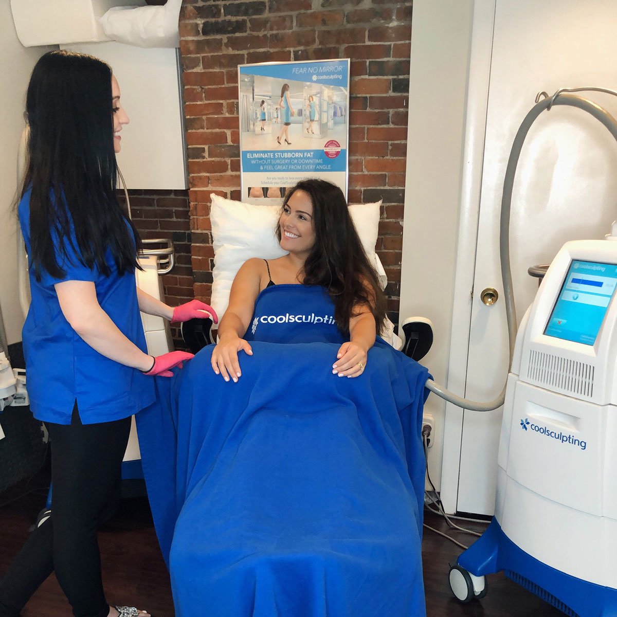 boston coolsculpting patient model receiving treatment with a med spa professional